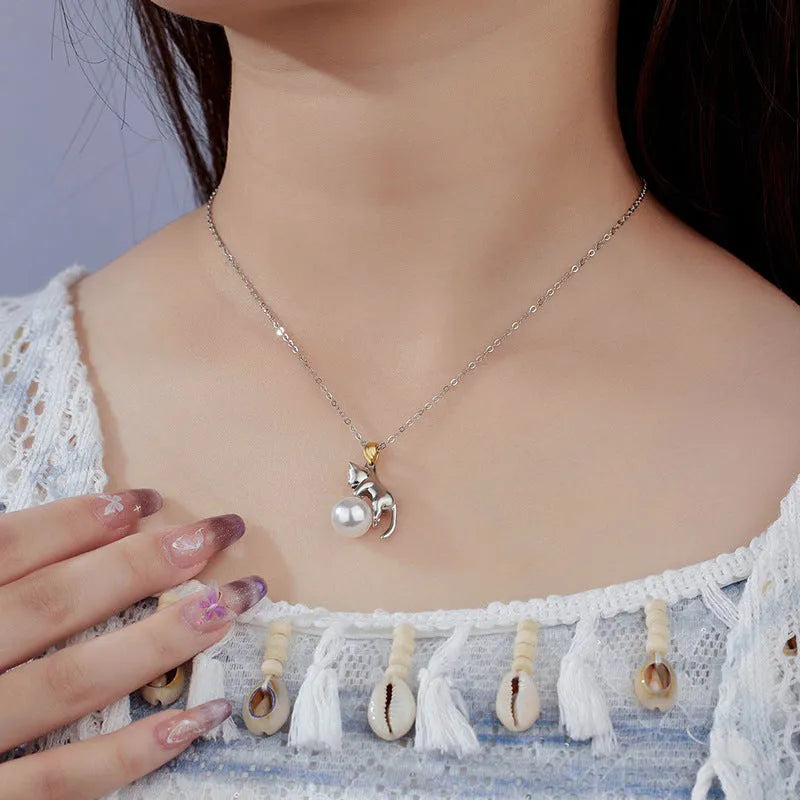 925 sterling silver clavicle necklace with a cat pendant and electroplated finish.