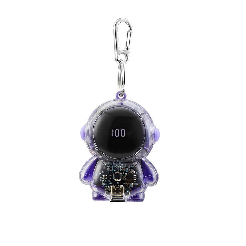 Small keychain emergency power bank in orange plastic shell with cartoon-style design and keyring attachment