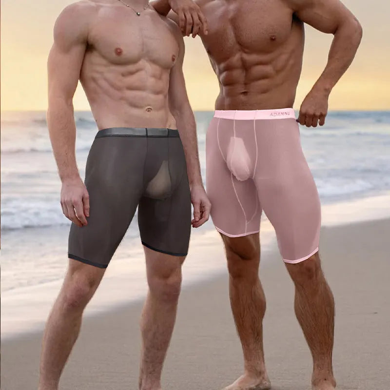 Men's black seamless mesh home shorts with a hip-lifting function, made from knitted nylon fabric.