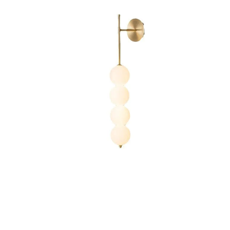 Nordic wall lamp in gold finish with tricolour light, rotomoulded construction for bedside atmosphere