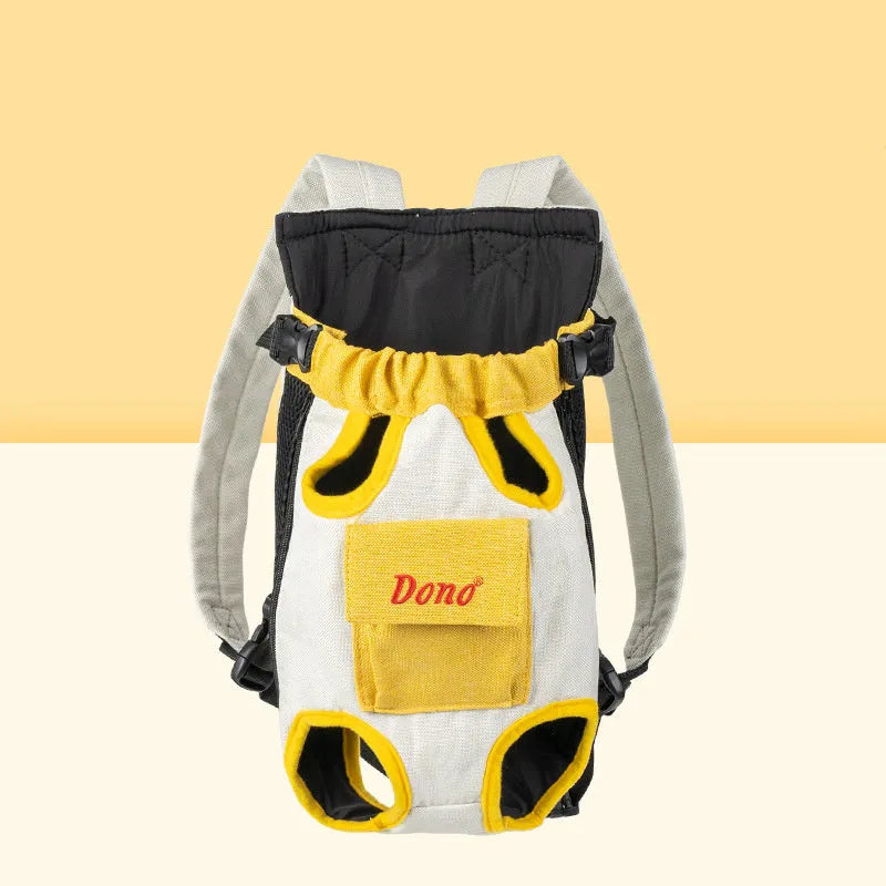 A person wearing a blue and yellow front-carry pet sling backpack containing a small dog, with adjustable cross-shoulder straps.