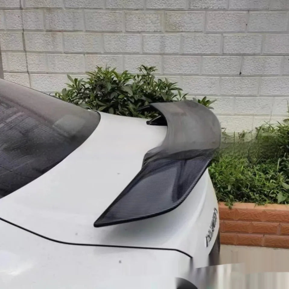 Punch-free ABS plastic car tail wing spoiler shown in bright black finish