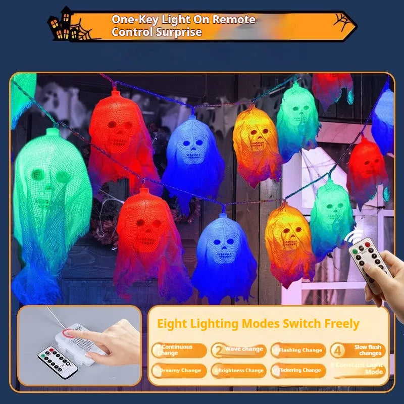 Halloween decoration LED fairy lights in coloured or warm white on a dark wall
