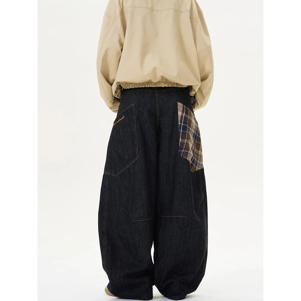 Man wearing loose-fit straight-leg plaid casual trousers in a retro style