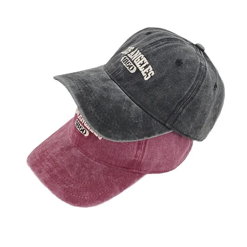Retro personalised peaked cap with letters embroidery in beige, adjustable strap visible.