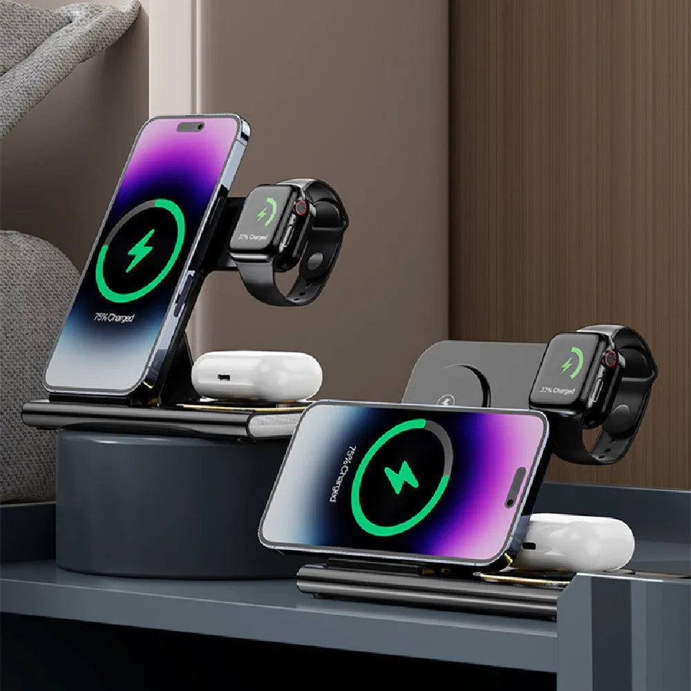 Black folding four-in-one wireless charger on a desk, showing its compact size and USB connection.
