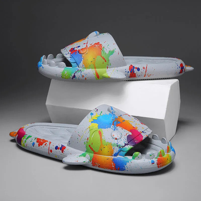 Casual open-toe shark design slippers in EVA material on a colour selection background.