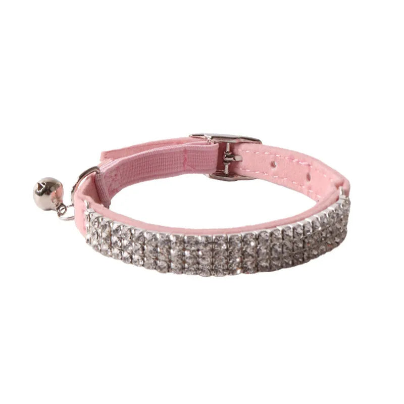 Elastic buckle cat collar with flocking material in gang drill design, shown in multiple colours.