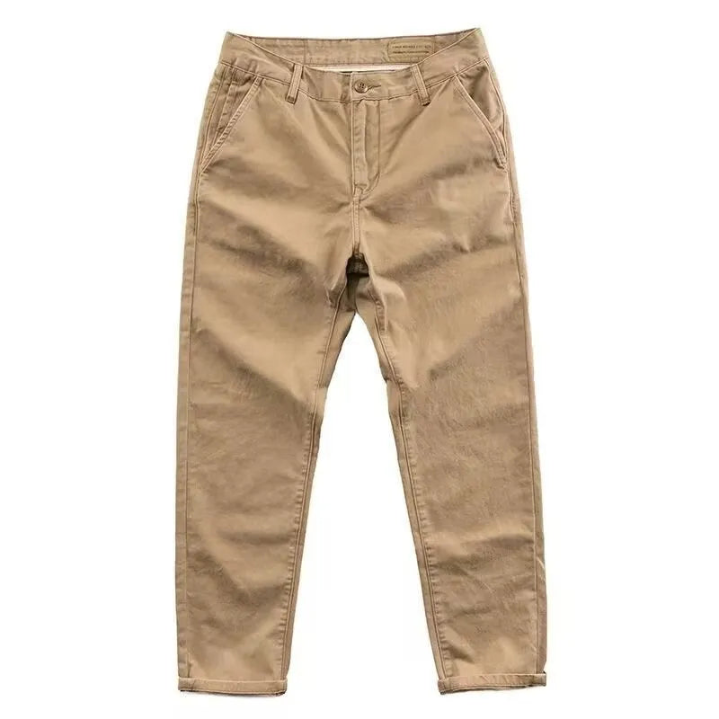 Men's slim fit casual trousers in grey with a straight leg design, made from a micro-elastic fabric blend.