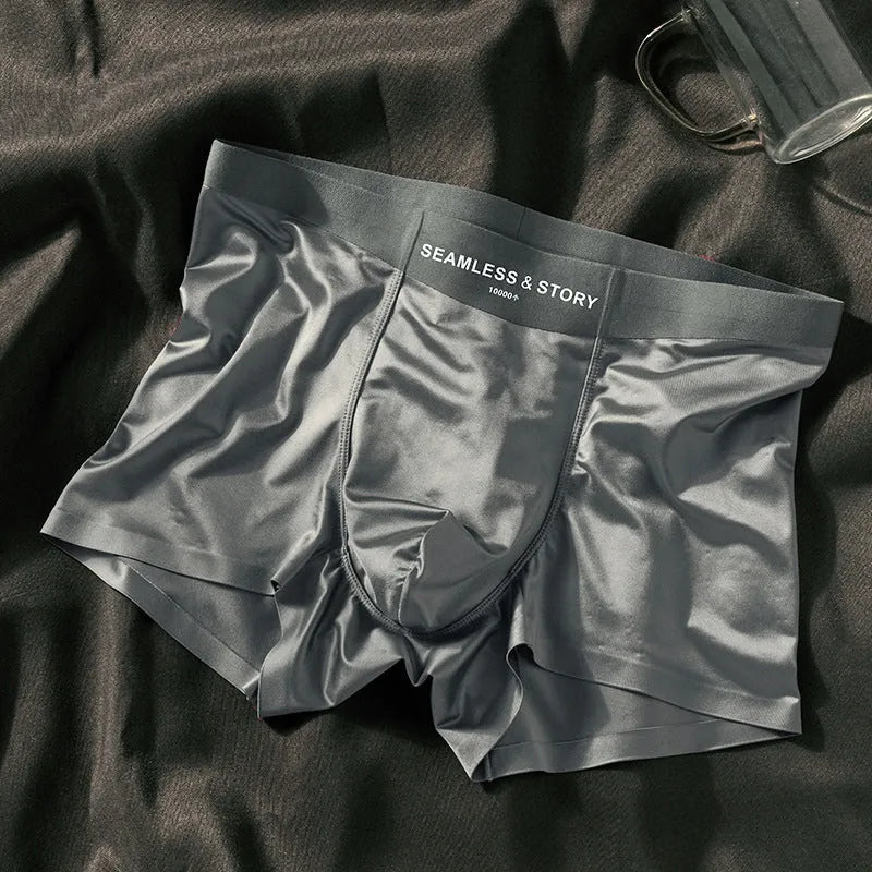 Men's ice silk boxer shorts in solid colours showing mid waist traceless design