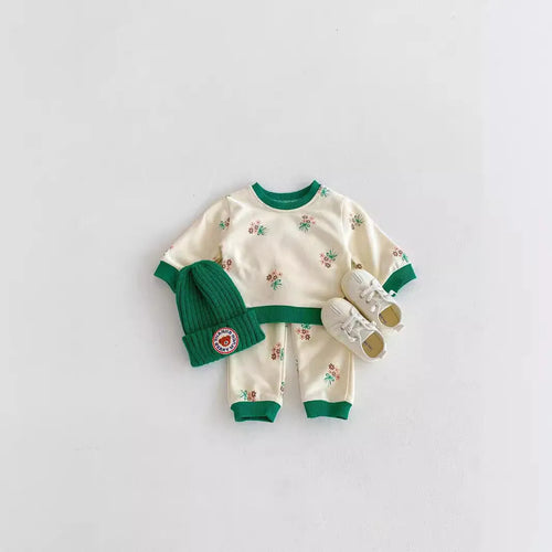 Baby cotton suit set in green with long sleeves and pants, front view