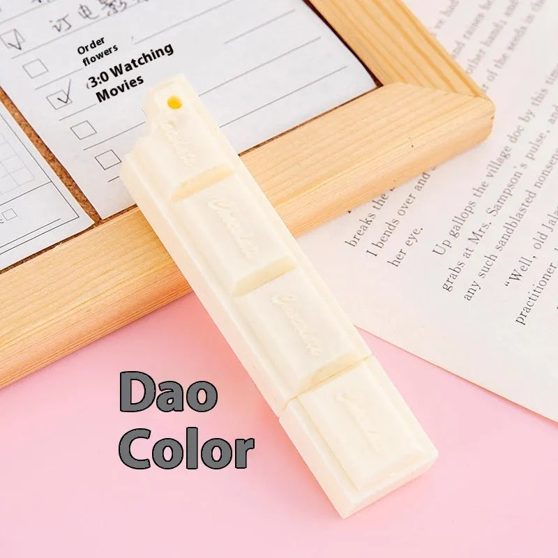 Chocolate bar themed novelty ballpoint pen with 0.5mm tip, shown in pink, beige, and brown refill colour options.