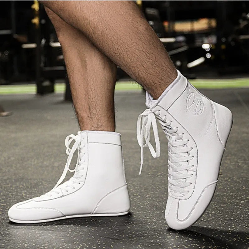 Black gold mesh professional boxing shoes with white leather accents and rubber sole