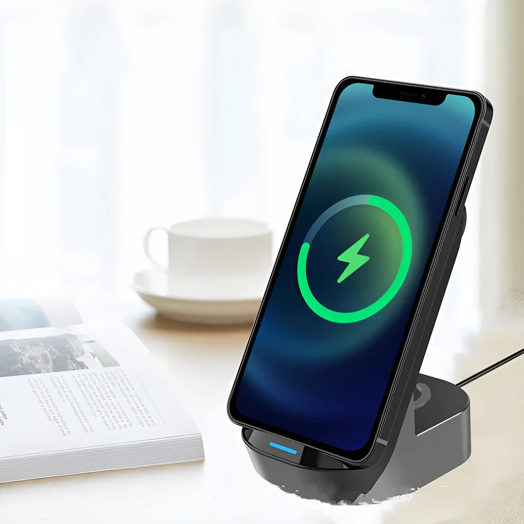 Black grey foldable 3-in-1 wireless charger stand holding a phone, Apple Watch and AirPods case.