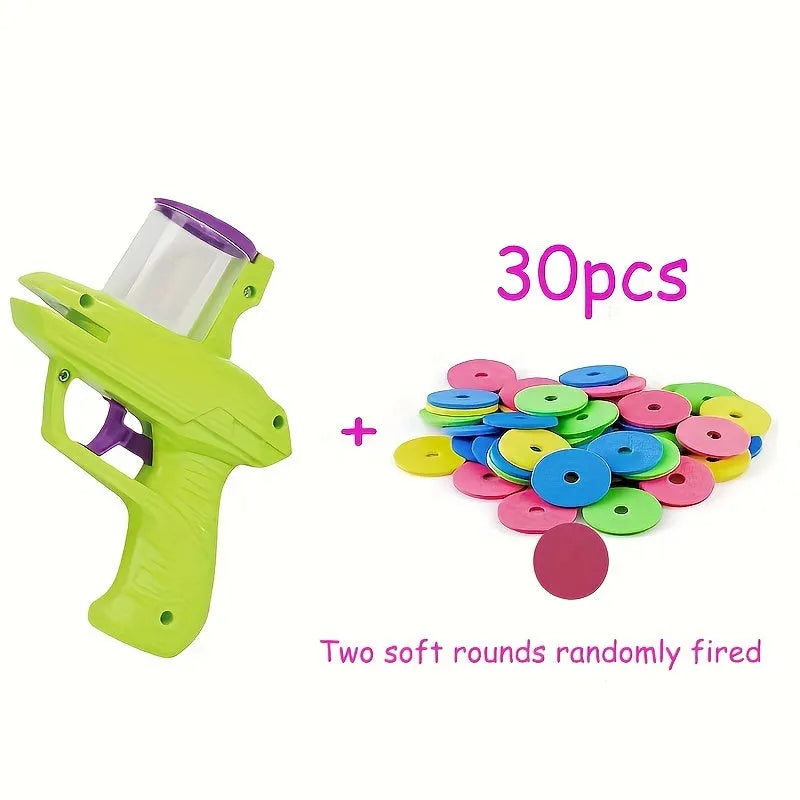 Green and purple manual cat toy launcher with foam discs for indoor pet play