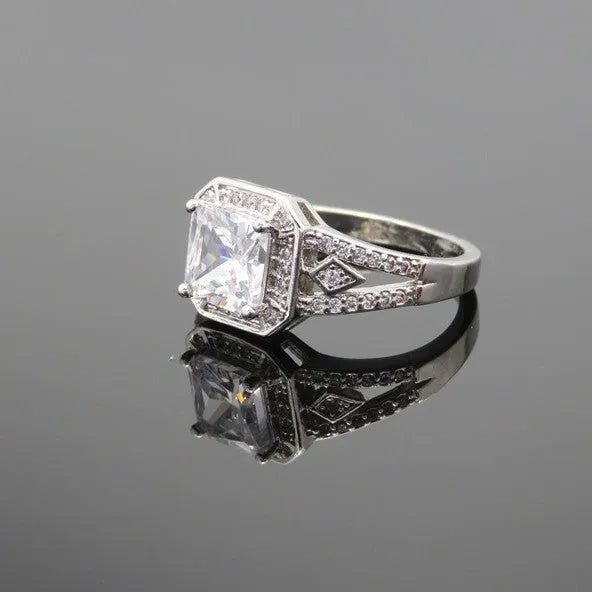 Geometric zircon women's ring with hollow ornament design in platinum colour