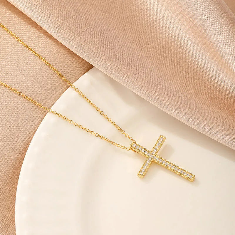 Women's copper necklace with electroplated finish showing heart, butterfly, cross, and round diamond pendant options