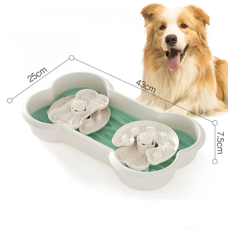 Large green slow feeder dog bowl with three separable puzzle trays and non-slip suction cups on base.