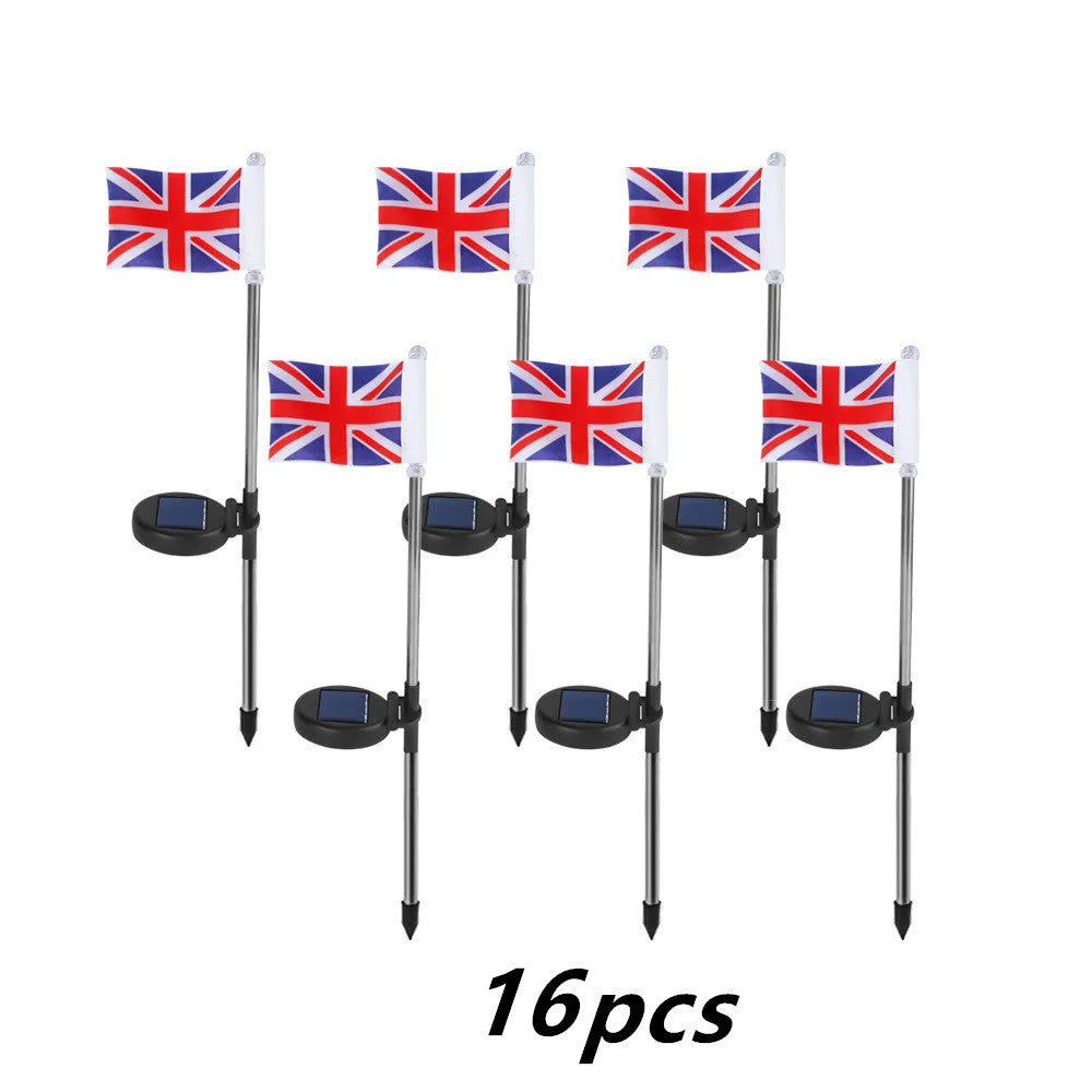 Solar-powered stainless steel garden flag light showing American flag design with white LEDs illuminated.