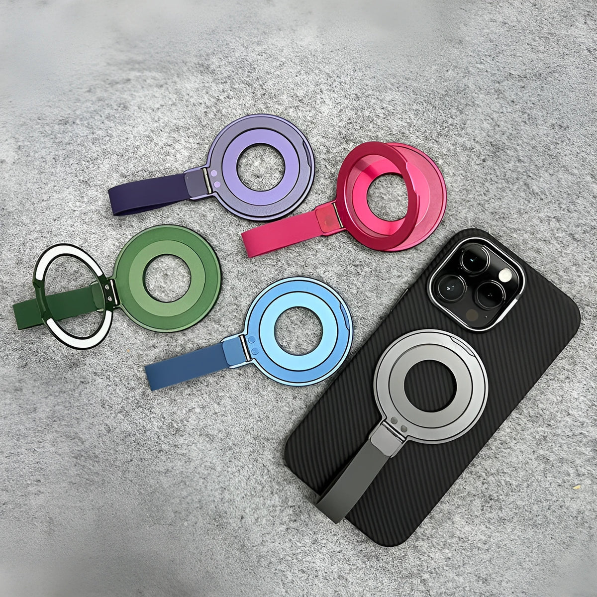 Portable magnetic wrist strap round silicone phone holder in hand, five colour options