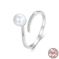 S925 sterling silver adjustable open loop ring with a natural shell pearl.