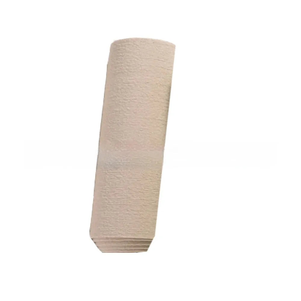 Self-adhesive cat scratch carpet mat in beige, trimmed to fit sofa arm, with scissors and roll packaging