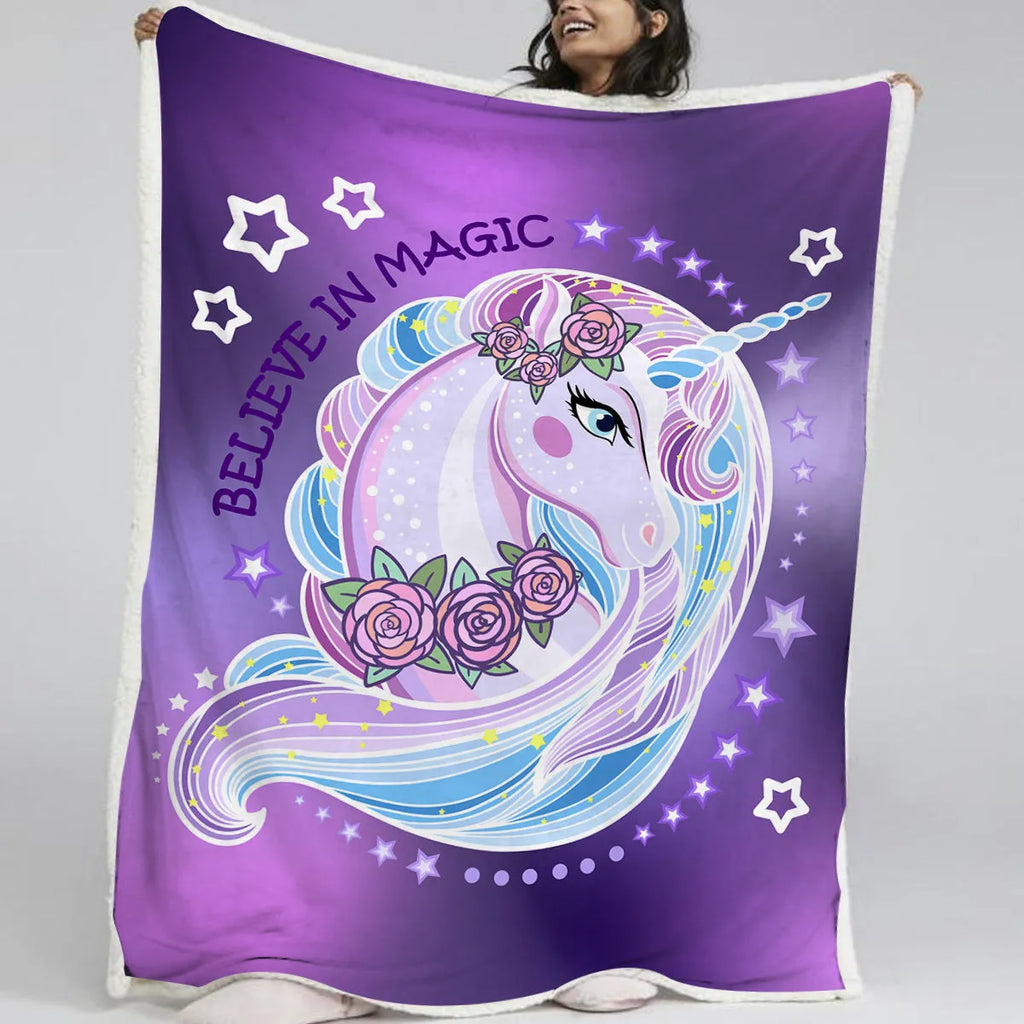 Purple unicorn themed lamb wool Sherpa fleece throw blanket 130x150cm with hemmed edges on sofa