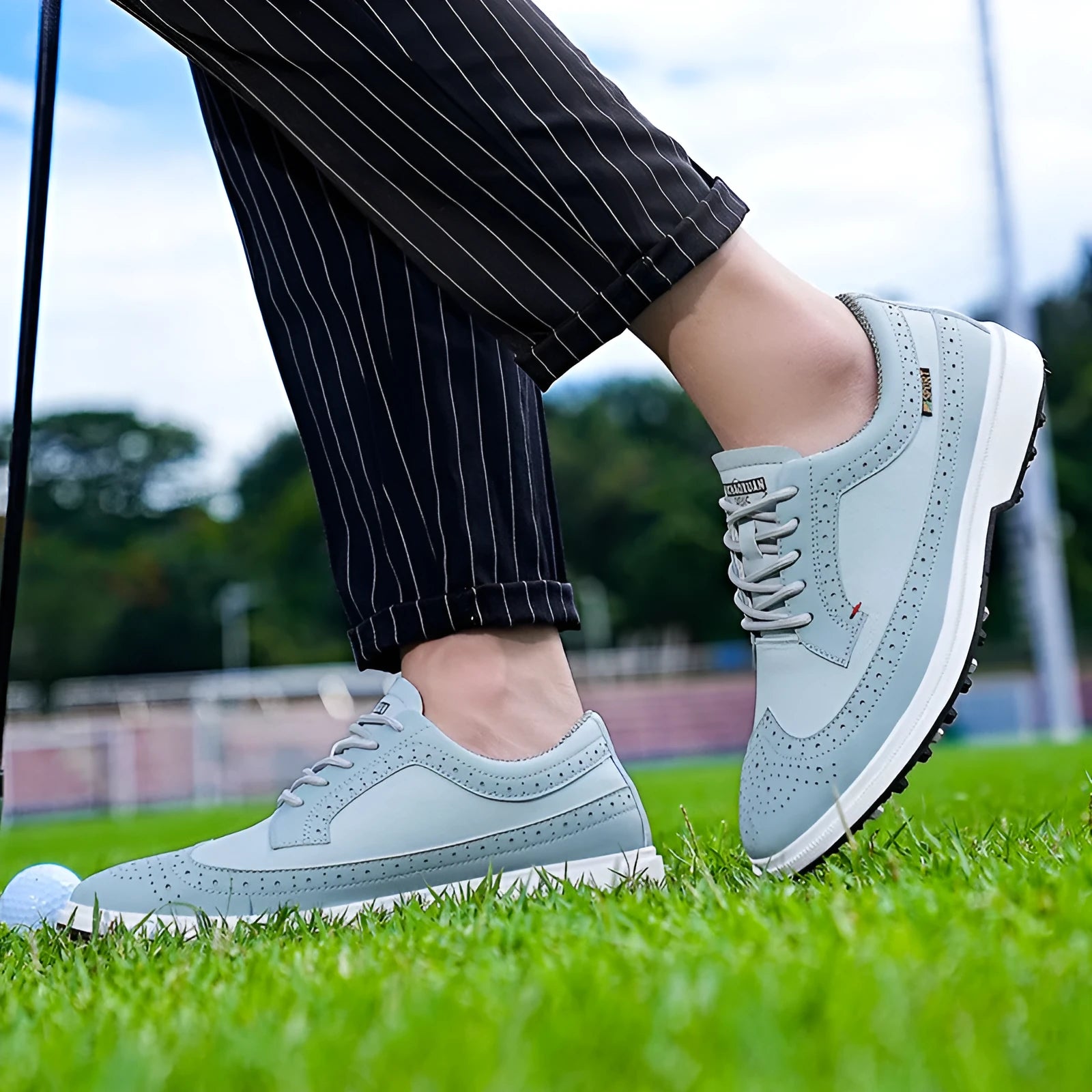Men's genuine leather golf shoe in lake blue with non-slip rubber outsole.