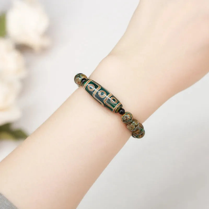 Handmade green dzi bead bracelet with barrel-shaped agate beads in unisex national style design