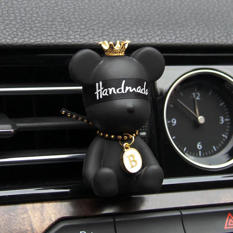Black rivet bear shaped gypsum car perfume accessory clipped onto vehicle air outlet