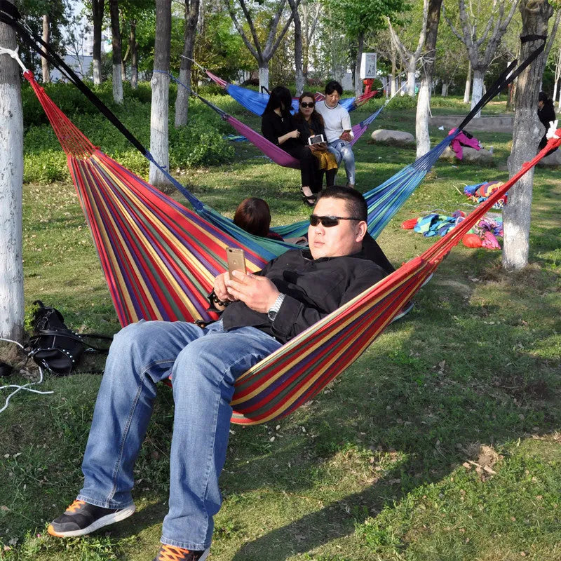 Canvas swing camping hammock with buckle in red anti-flip colour, fabric material, outdoor setting