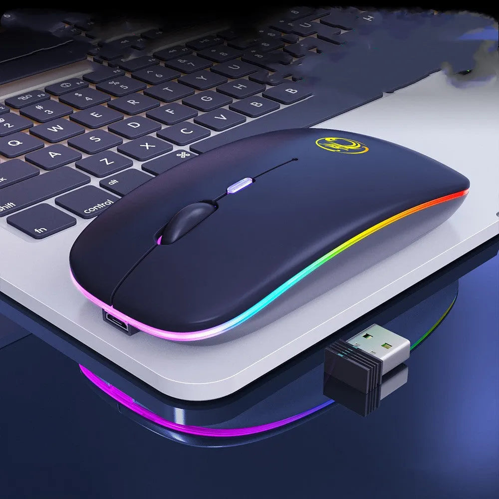 Black and white rechargeable dual-mode wireless mouse with silent buttons on a desk.