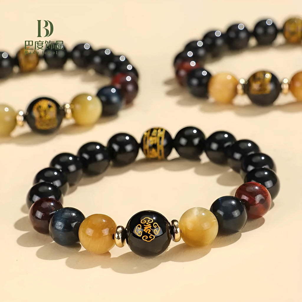 Handmade black agate beaded bracelet with Buddhist carving and tiger eye gemstones