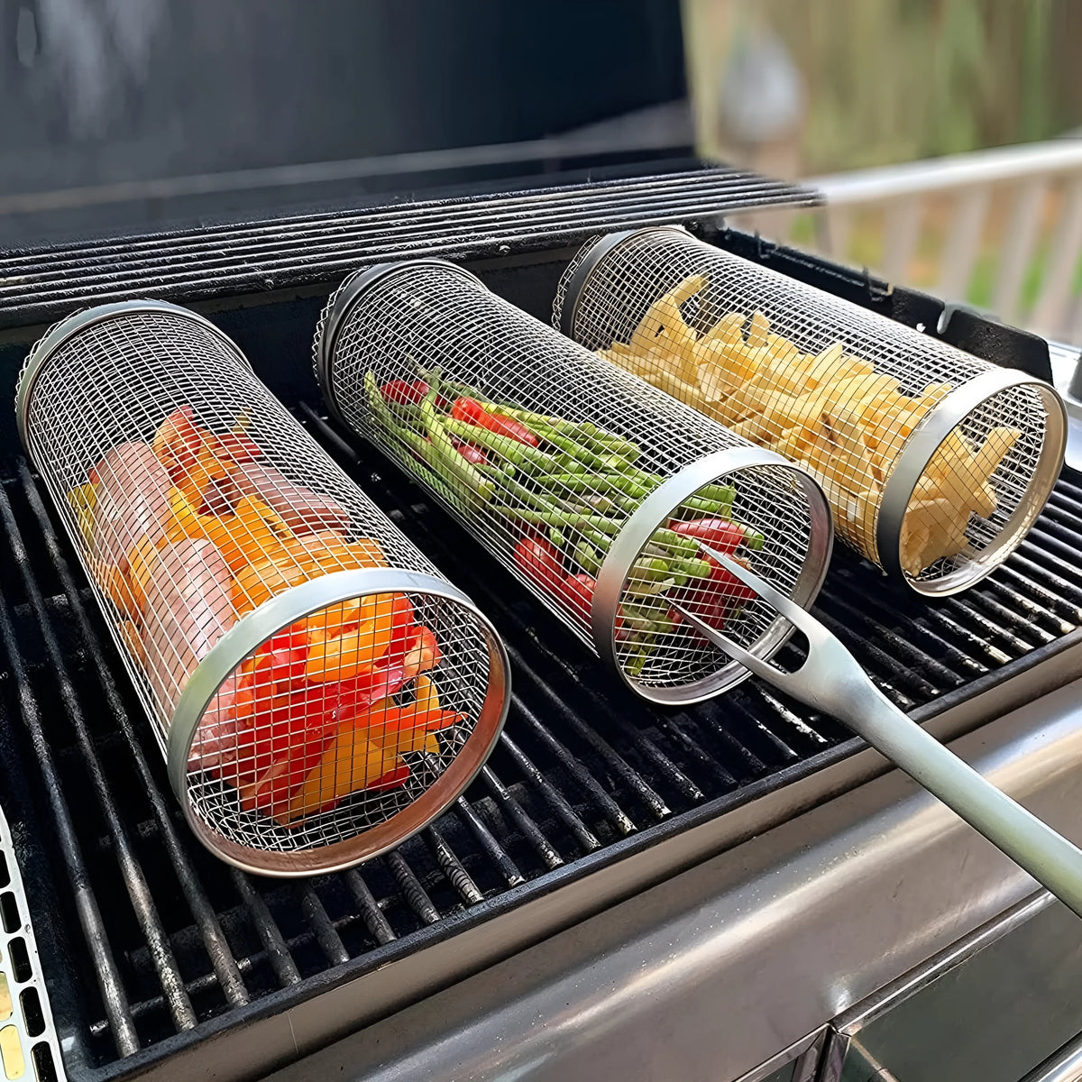 Rolling grill basket iron wire mesh 20x10x10cm with hook, filled with vegetables on a barbecue