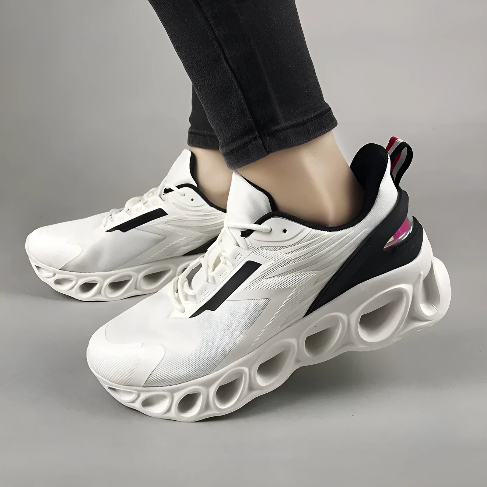 Men's casual mesh sports shoes in black, white, and dark blue colours with front lace-up closure