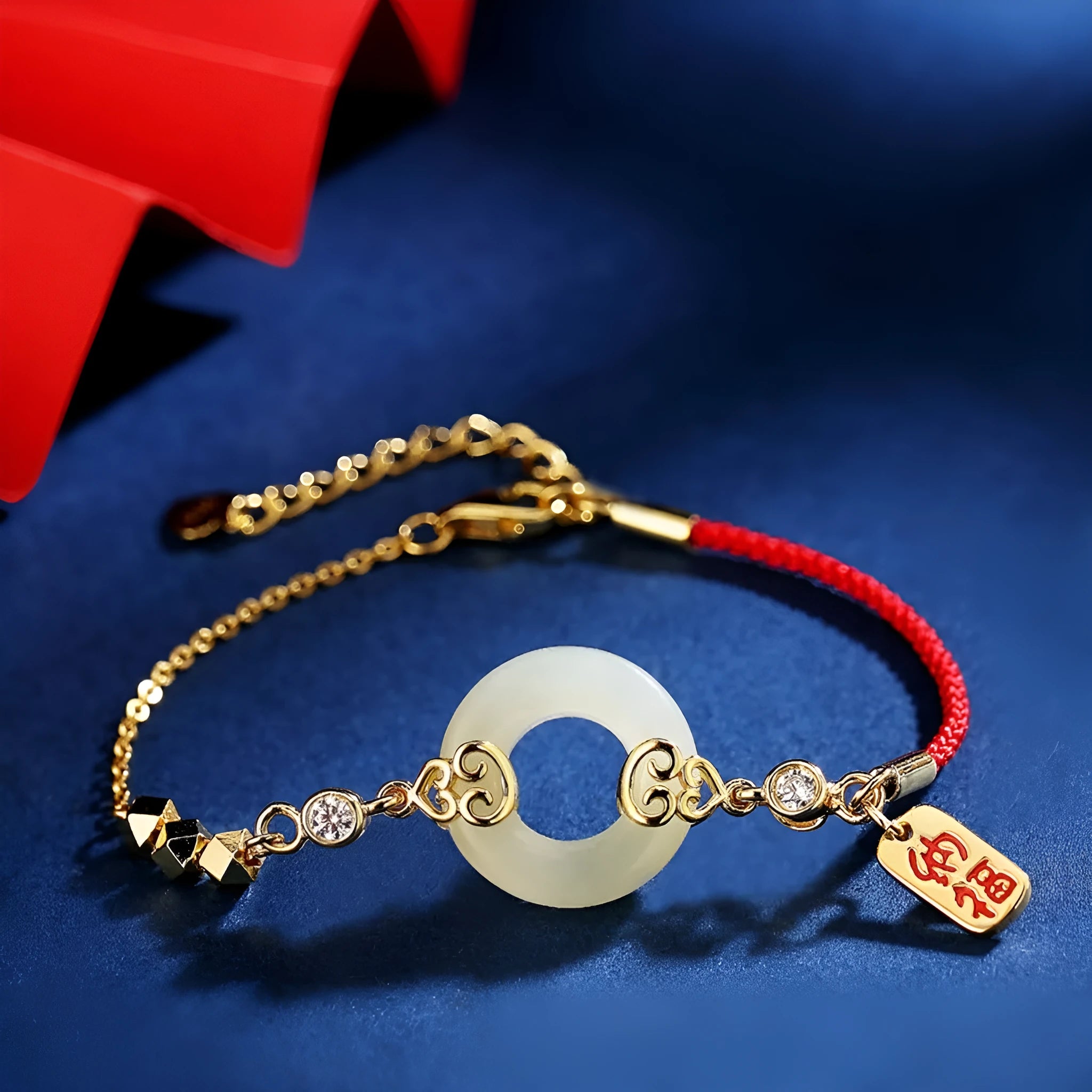 Women's sterling silver jewellery set with gourd bracelet, Fu necklace, and earrings featuring inlaid Hetian jade.
