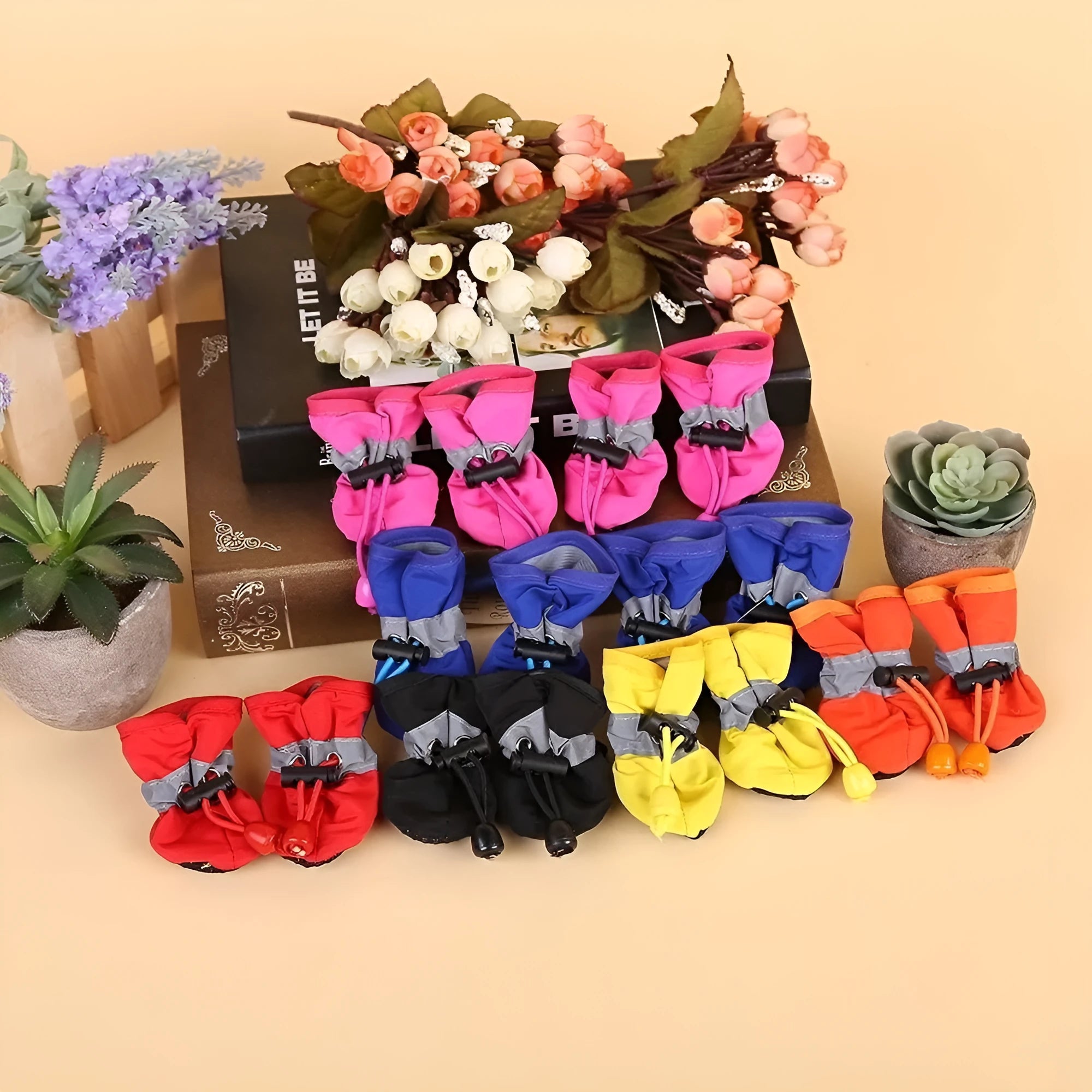 Breathable cloth dog shoes with soft soles available in multiple colours and seven size options