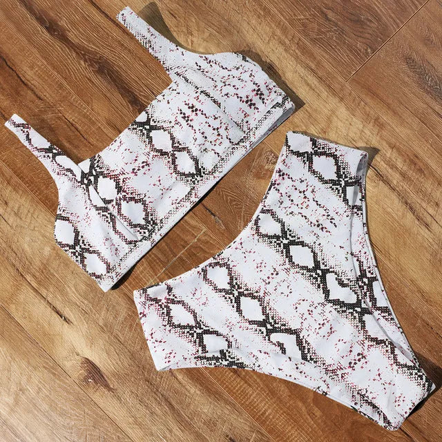 Women's high waist leopard print bikini set with push-up top and matching briefs on a mannequin.