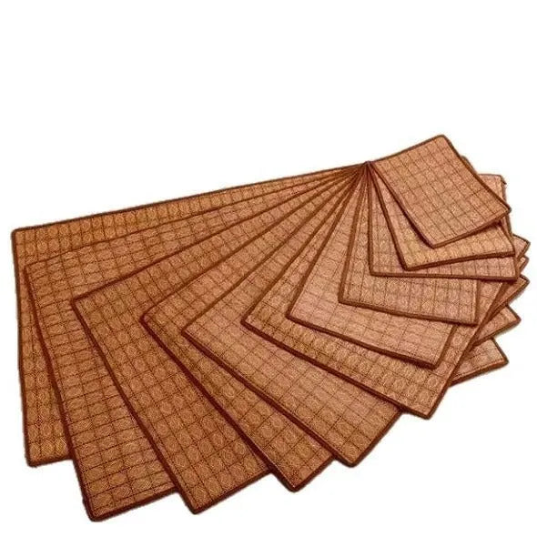 Brown woven rattan cooling mat for dogs, shown in a large size on a wooden floor.