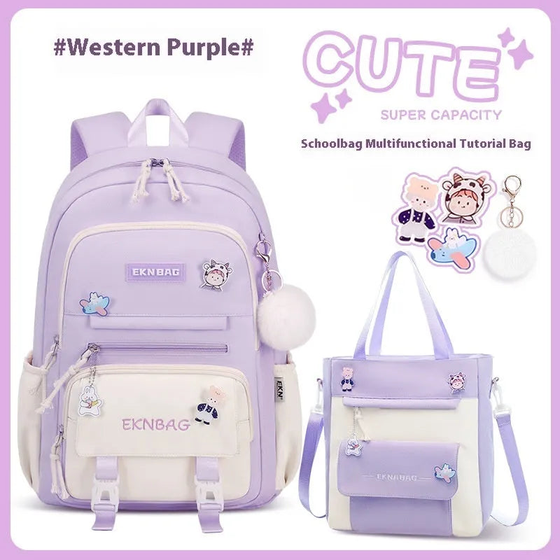 Girls' pink waterproof Oxford cloth school backpack with curved shoulder straps.
