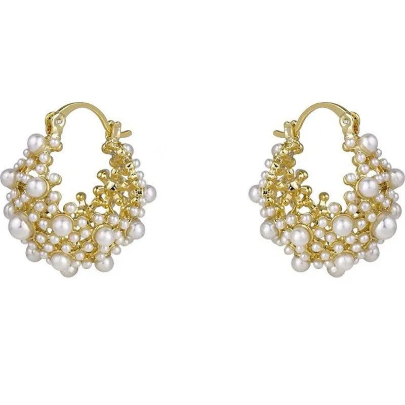 Gold floral basket earrings with pearl inlay and rice-shaped bead construction