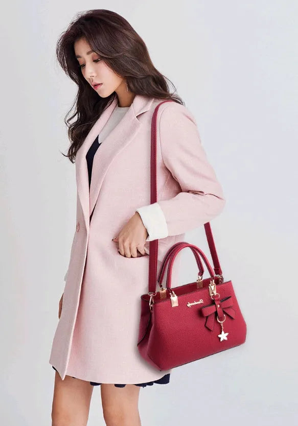 Women's medium cross section square PU casual shoulder handbag with belt decoration and soft handle