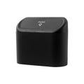 Black foldable plastic car trash can with waterproof lining, designed for mounting behind a car seat.