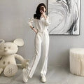 Women's casual two-piece set in white with short zipper sweater and wide leg trousers, polyester fabric, collage stitching
