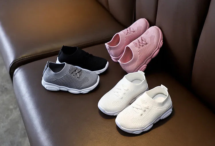 Children's fabric slip-on shoes with non-slip rubber soles in white, black, pink or grey colours