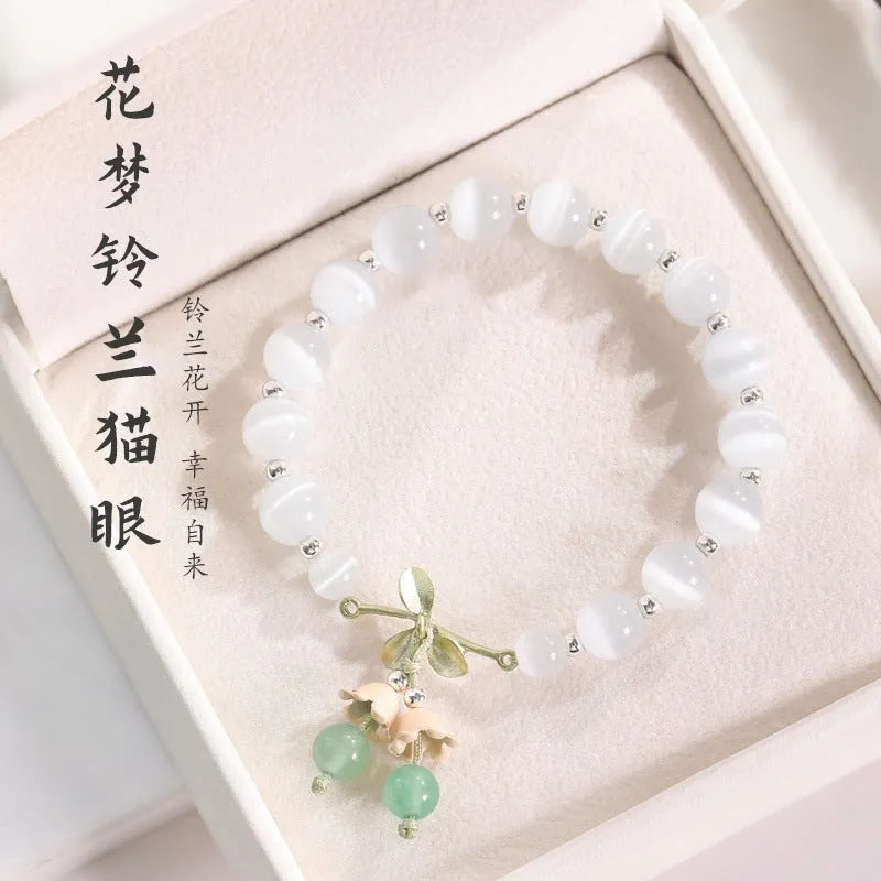 Women's cat's eye stone beaded bracelet with diamond-shaped opal beads and electroplated metal clasp in one of sixteen colour options