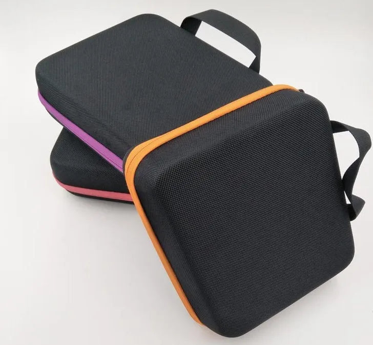 Red EVA cube-shaped bag with 30 compartments for 15ml essential oil bottles, shown with zipper open.