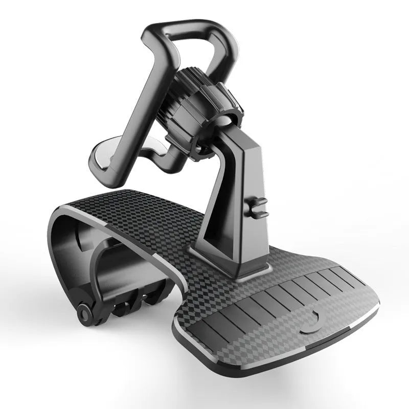 Black adjustable car phone holder with 360-degree rotating head on a car dashboard.
