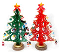 Hand painted wooden Christmas tree desktop decoration in red and green colours measuring 36cm tall