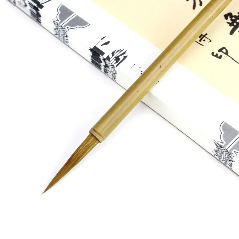 Traditional Langhao Chinese calligraphy brush with wolf hair nib for detailed ink painting